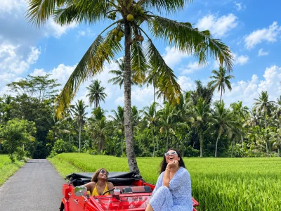 Tropical Joy with a Classic Red Convertible